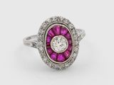 an antique ruby and diamond cluster ring