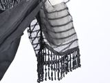 a black scarf hanging on a clothes rack on a white background
