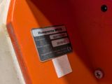 a label on the side of a orange box