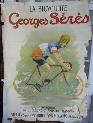 une affiche représentant un homme à vélo dans la rue