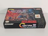 the box of the game contra ii is sitting on a white surface
