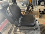 an image of a car seat in the back of a truck