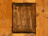 close up of a piece of wood with a hole in it