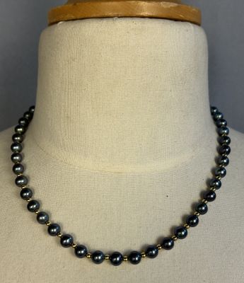 a close up of a necklace on a mannequin mannequin mannequin mannequin mannequin mannequin mannequin mannequin