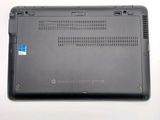 an image of a laptop with a blue sticker on it
