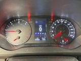 a close up of a car dashboard with a speedometer and gauges