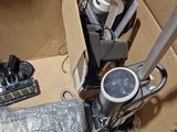 a cardboard box with a bunch of electronics inside of it