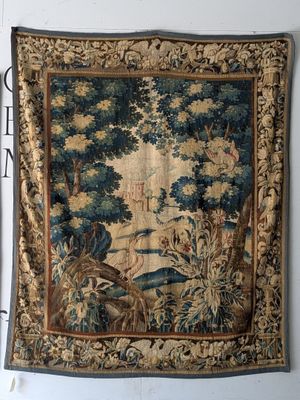 an image of a tapestry hanging on a wall in a room