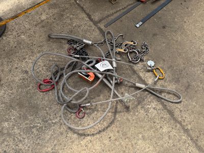 a pile of wires and other items on the ground
