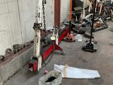 a picture of a garage with a lot of tools on the floor