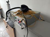 Laser comprenant : (photo 2)