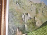 a painting of a man riding a bike down a dirt road