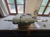 a machine that is sitting on a table in front of a window