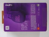 packaging of a purple computer mouse sitting on top of a white table
