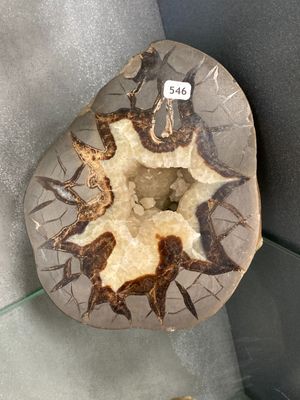 a large piece of rock that is on display in a glass case