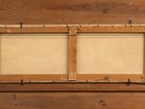 a picture of a picture hanging on a wooden wall