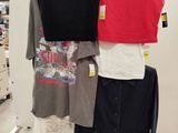 a display of clothes on a rack in a store
