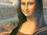 painting of a woman with long hair and a brown dress