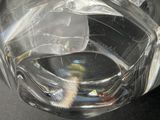 a close up of a glass vase with water inside of it