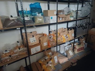 a shelf with many different types of food on it