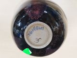 a close up of a wine bottle on a table