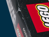 a close up of a box of legos on a table
