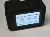a small camera that is sitting on a table