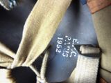 a close up of a tie with a tag on it