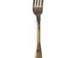 a fork that is sitting on top of a table