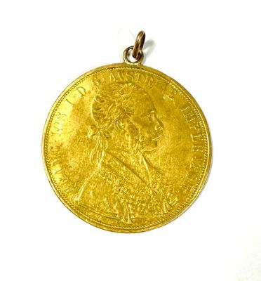 an image of a gold coin on a white surface
