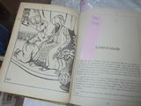 an open book with a picture of a man and a woman on it