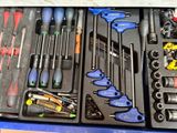 many different tools in the case on the table