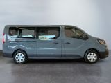 an image of a blue van parked in a garage