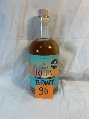 a bottle of rum that is sitting on a table