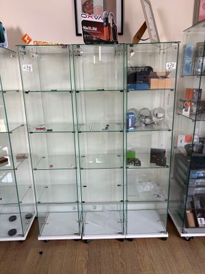 a lot of glass shelves that are on the floor