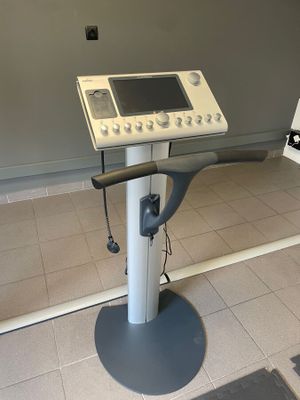 a machine that is sitting on a stand in a room