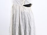 white lace dress with black belt on mannequin torso