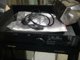 a radio sitting on top of a table next to a lamp