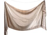 an image of an old cloth hanging on a clothes line