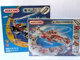 two boxed boxed legos of different sizes and colors on a white surface
