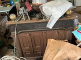 a room filled with lots of clutter and junk