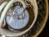 a close up view of the inside of an old telephone