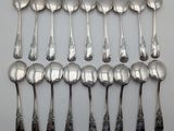 a lot of spoons that are sitting on a table