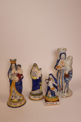 three figurines of the nativity of jesus, mary, joseph, and joseph