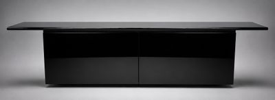 black sideboard with two doors and a glass top on a grey background