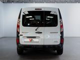 a white van that is parked inside of a building