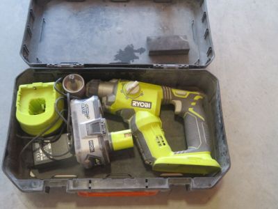 a tool in a toolbox with a hammer and other tools
