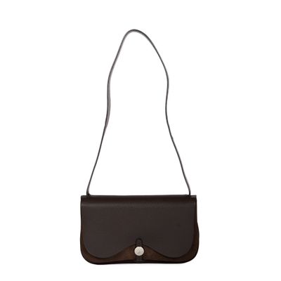 a brown and black purse with a metal clasp on a white background