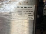 a box of ice cream machine sitting on a table