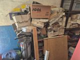 a pile of boxes and other items in a room